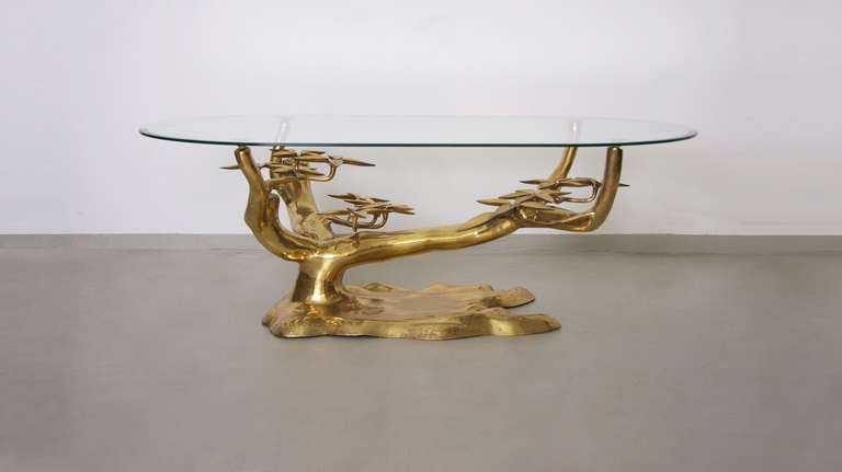 Beautiful organic tree-shaped brass coffee table. Attributed to Willy Daro. Glass top is included.