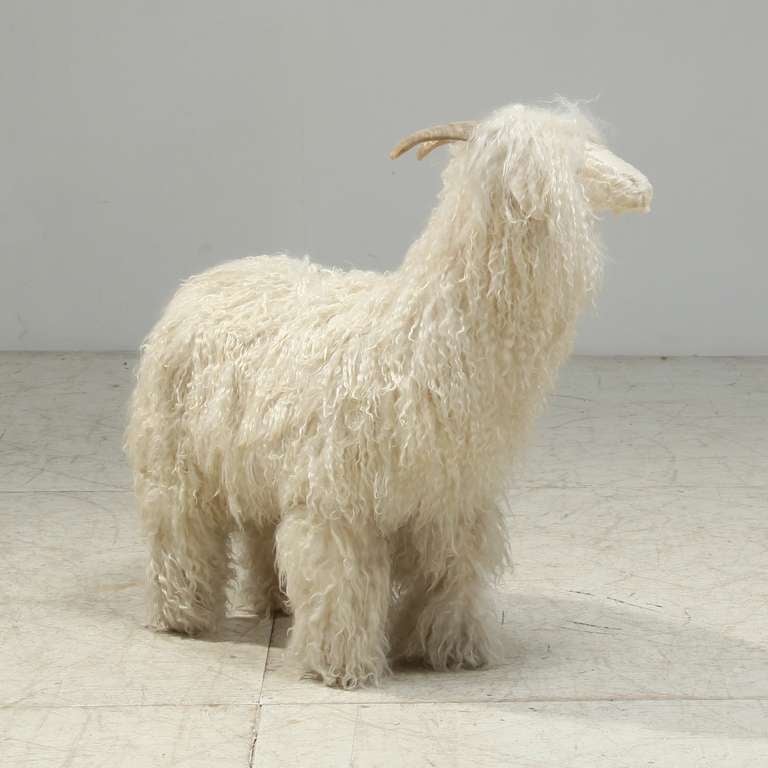 Folk Art Decorative mountain goat with woolen skin