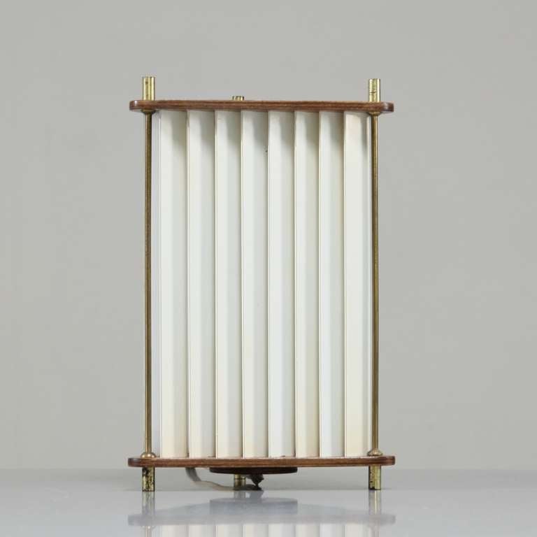 Mid-20th Century Ib Fabiansen attributed triangle teak and plexiglass table or bed lamp, 1960s For Sale