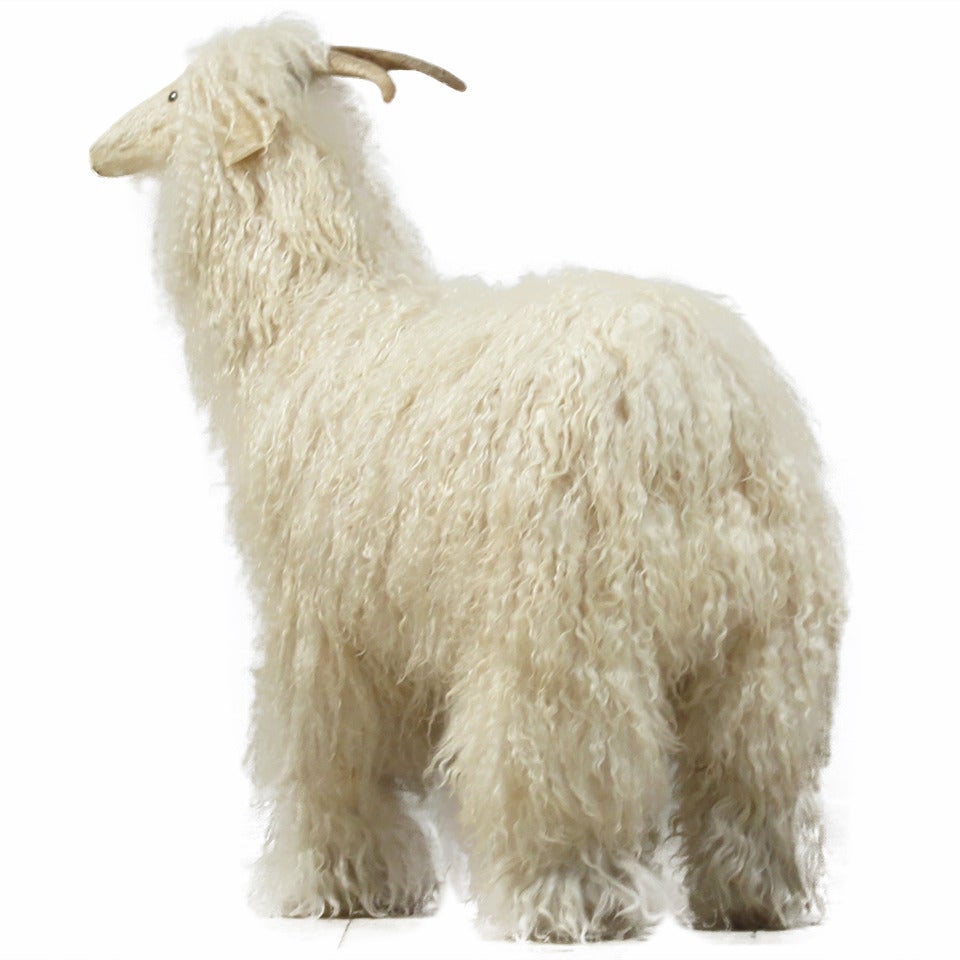 Decorative mountain goat with woolen skin