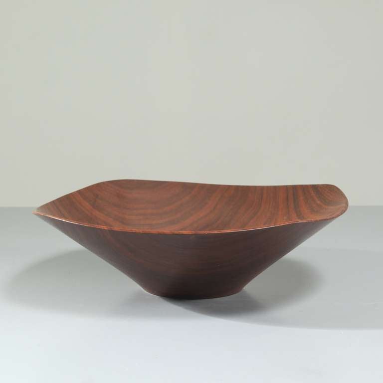 A small walnut bowl by famous American woodturner Rude Osolnik, signed underneath.
