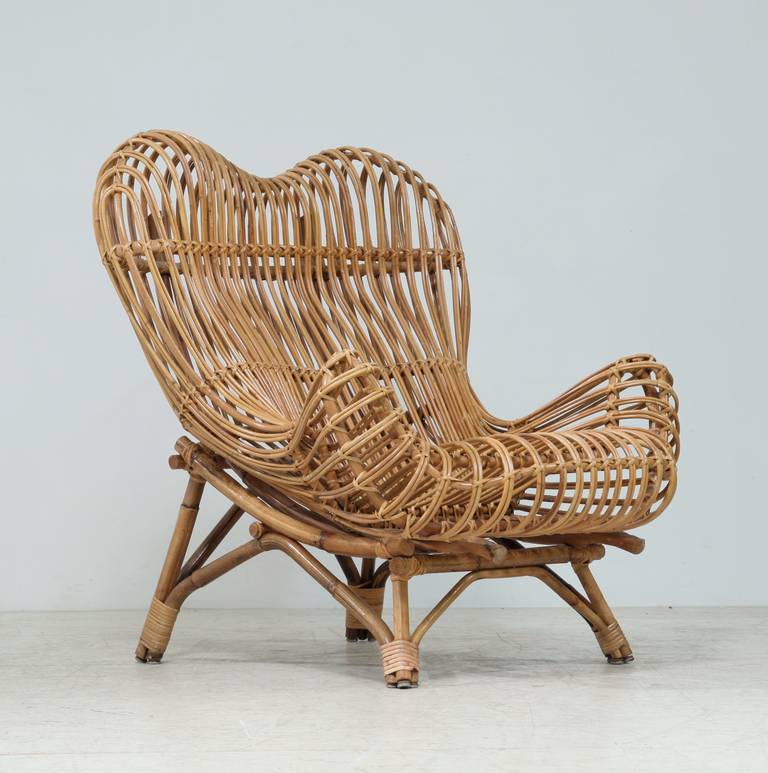 An original and stunning Gala armchair in bent reed, designed by Franco Albini in 1951. The seat can be moved to a more relaxing or more active posture, resp image 5 and 6.