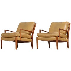 Pair of Arne Norell Lounge Chairs in Camel Colored Leather