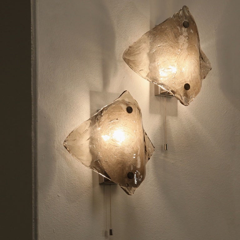 Handblown Italian glass wall fixtures with rope switch.
Beautiful natural color tones in the glass and perfect condition, both the glass and wiring.

* This set is offered to you by Bloomberry, Amsterdam *