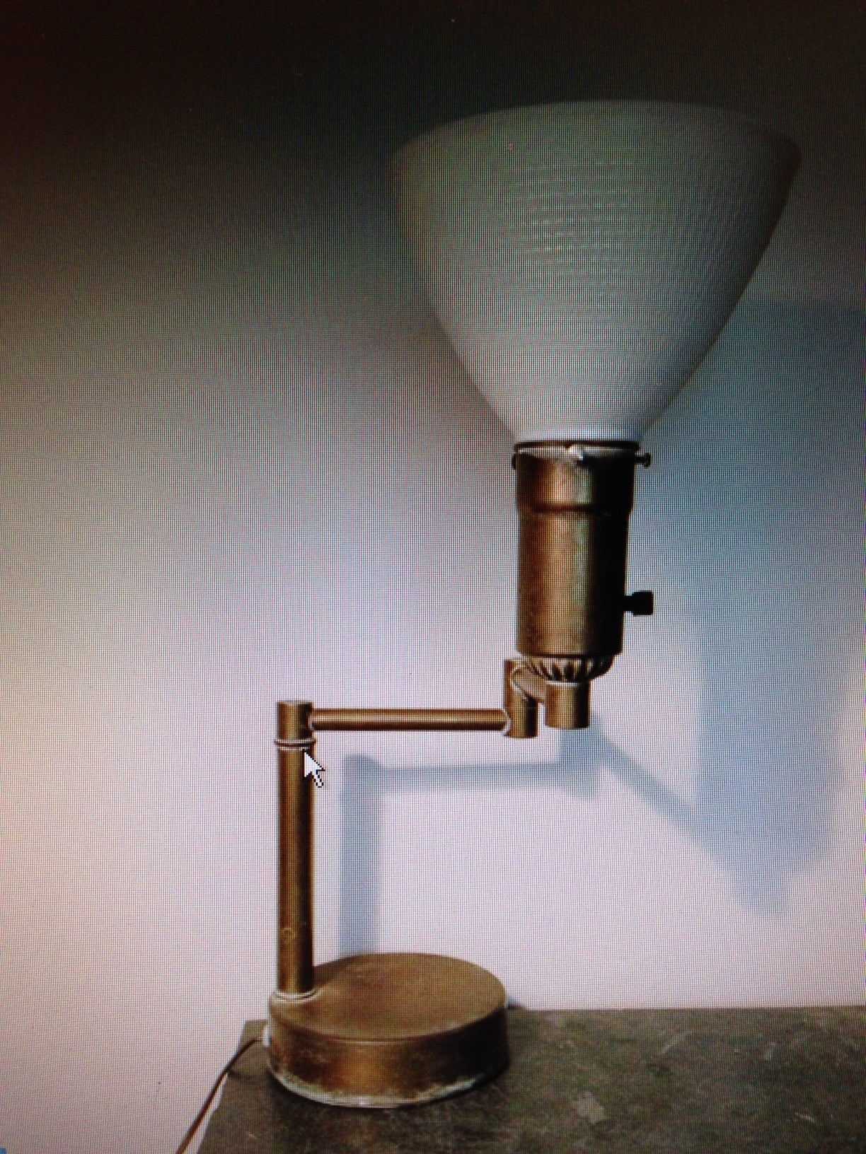 A Walter Von Nessen Swing-Arm Table Lamp in Brass. American, 1950s For Sale