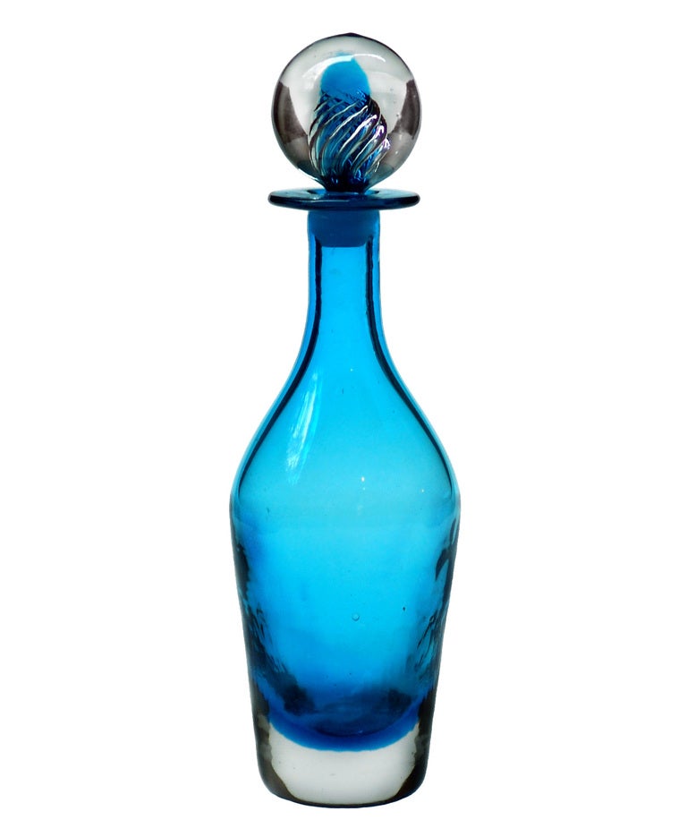 Decanter with sommerso base and paperweight 'ariel' technique ball stopper, designed by Joel Philip Myers in 1967.
Design #6724 in Turquoise, pictured in the 1967 catalog.

___

All our glass is vintage mid-20thC hand blown art glass. Items are