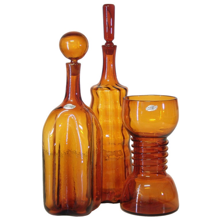 A trio of decanters in Honey design by Joel Philip Myers for Blenko For Sale