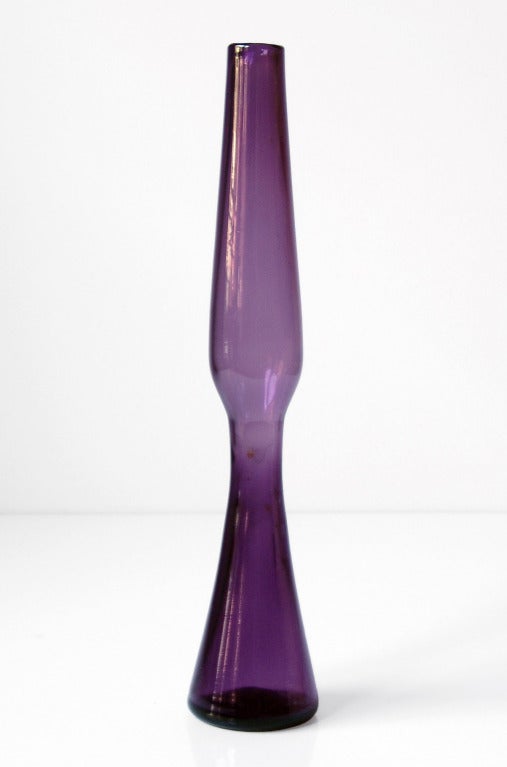 _____
(Items also available individually, please email to inquire.)

LEFT: thin rocket-like vase with conical base, designed by Wayne Husted in 1960, made for 2 years only. Design #6024 in Lilac, pictured in the 1960 catalog on page twelve