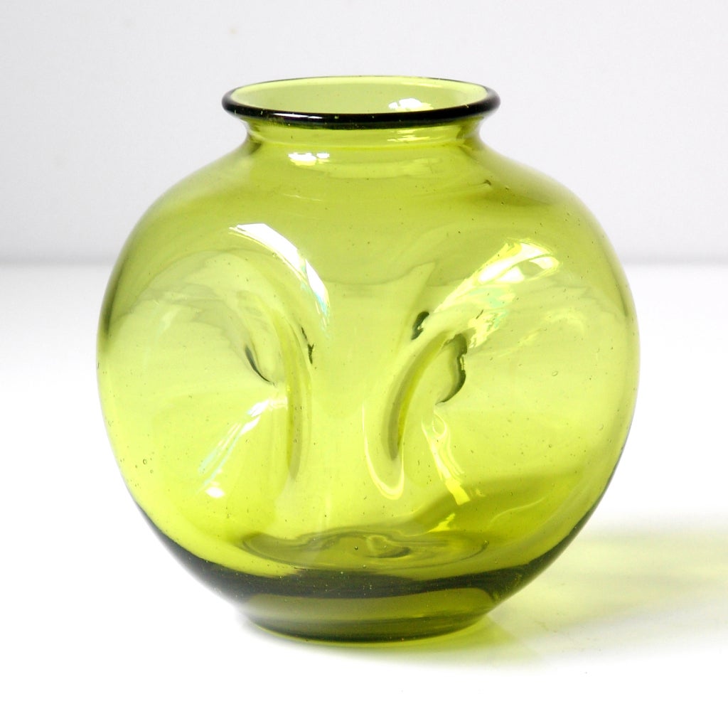 _____
(Items shown in groupings are also available individually, please email to inquire.)
A grouping of three vintage glass vases in Chartreuse, designed by Winslow Anderson for the Blenko Glass Company.

LEFT: Quadruple-indent ball vase,