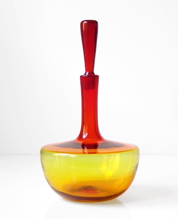 American A trio of Tangerine decanters by Joel Philip Myers for Blenko