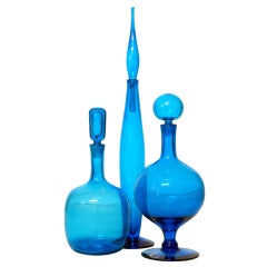 A Grouping of Vintage Blenko Glass Decanters in Turquoise