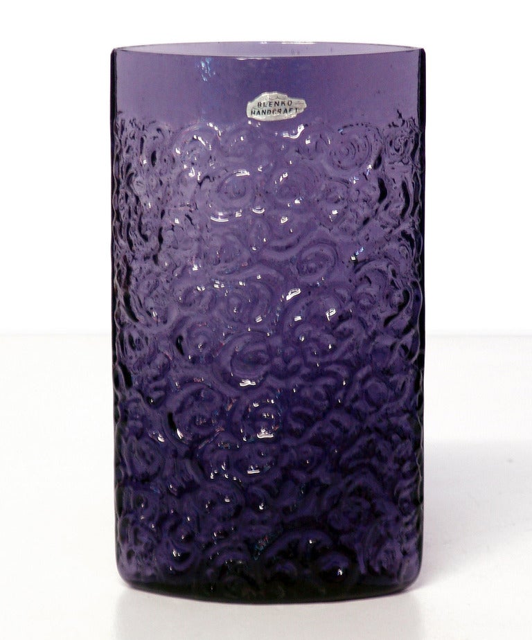 heavily textured narrow elliptical vase, designed by Joel Philip Myers in 1967, made for 1 year only.
Design #6731 in Plum, pictured in the 1967 catalog .

___

All our glass is vintage mid-20thC hand blown art glass. Items are guaranteed to be