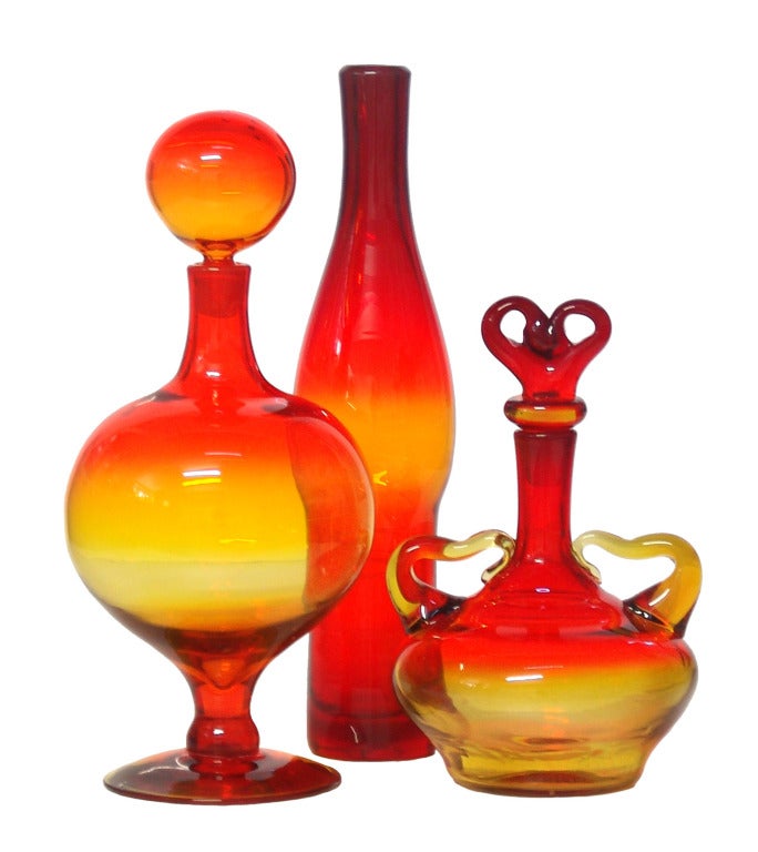 A trio of designs in Tangerine produced by the Blenko Glass Co For Sale