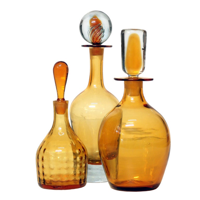 Grouping of golden Wheat colored decanter by the Blenko Glass Co