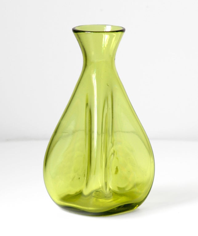 ______

(Items also available individually, please email to inquire.)

LEFT: small vase with four inverted faces creating a pronounced quatrefoil form, designed by Winslow Anderson in 1953.
Design #533 in Chartreuse, pictured in the 1953