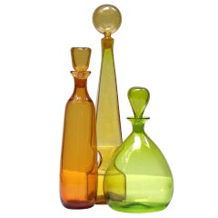 Autumnal toned trio of Retro Blenko glass decanters