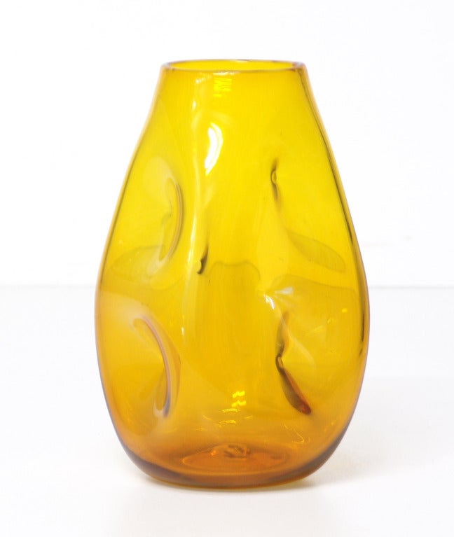______

(Items also available individually, please email to inquire.)

LEFT: small dimpled or indented ovoid vase, designed by Winslow Anderson in 1950, made for 2 years only in this color.
Design #921M in Gold, pictured in the 1950 catalog