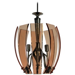 An Italian Pendant Light In Copper Coloured Glass An Italian Pendant Light In Copper Coloured Glass