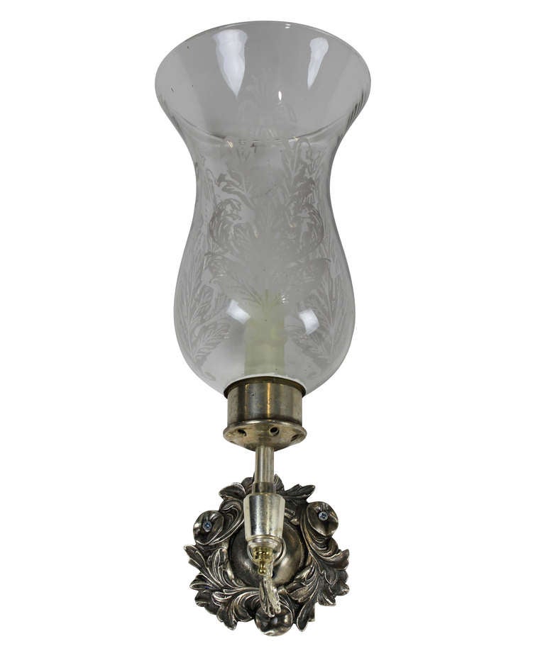 A Set of Four Storm Shade Wall Sconces