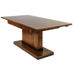 A Fine Extendable Dining Table By Rowley