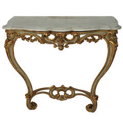 A French Carved, Painted and Gilded Serpentine Console