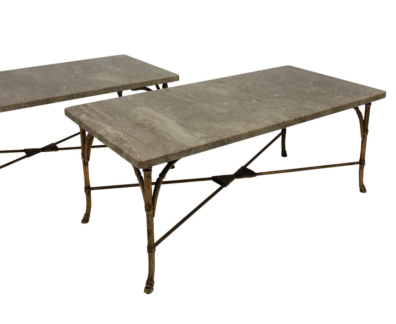 A pair of gilt bronze occasional table by Maison Bagues, in faux bamboo and with fossil marble tops.