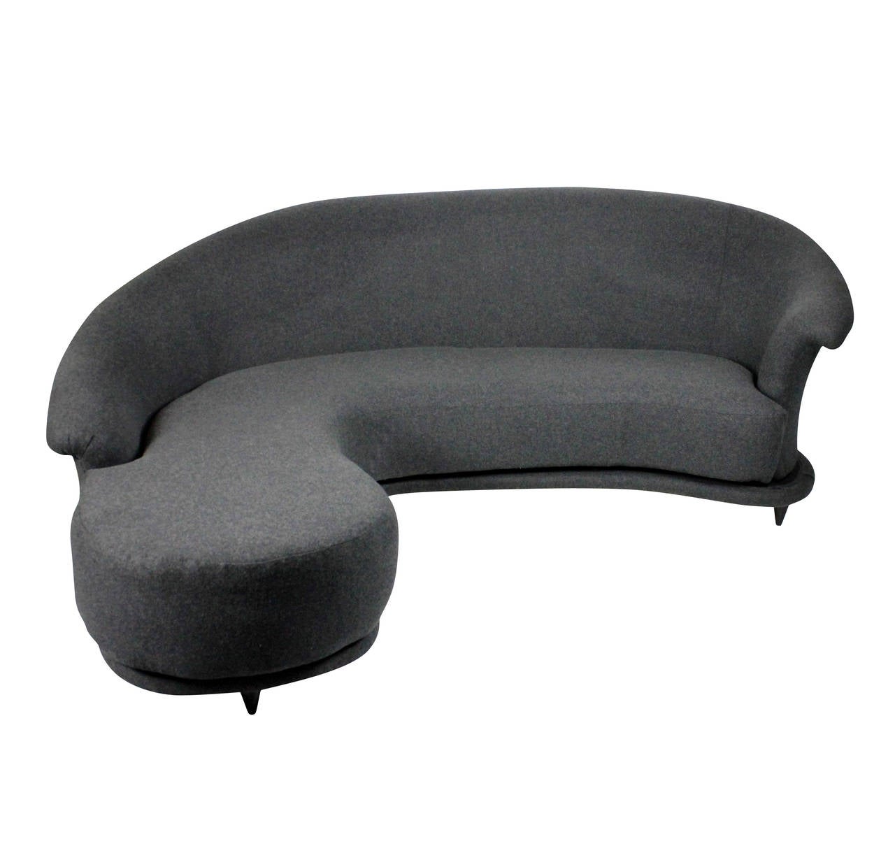 A large Italian sculptural comma sofa, elegant proportions, on tapering wooden feet. Newly upholstered in grey wool.
This sofa comes apart for transportation purposes.
