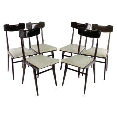 A Set Of Six Cassina Dining Chairs