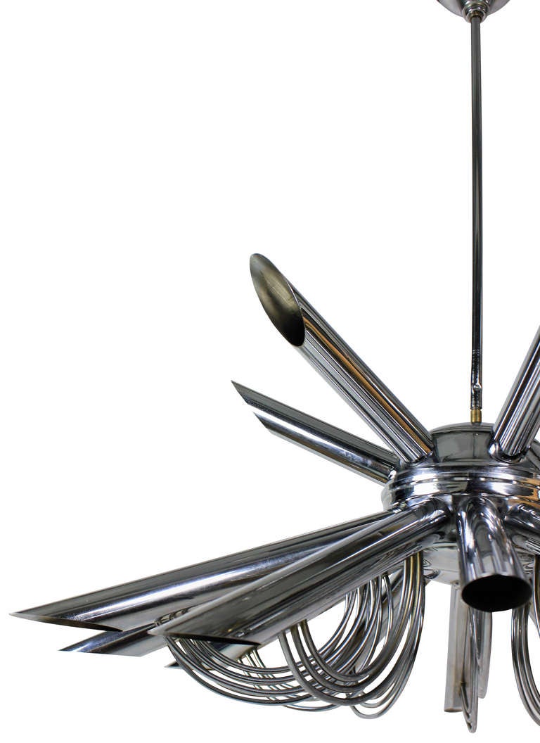 An Italian chandelier by Gaetano Sciolari in chrome. Comprising eighteen tubular arms resembling a satellite.

Eighteen lights in total.