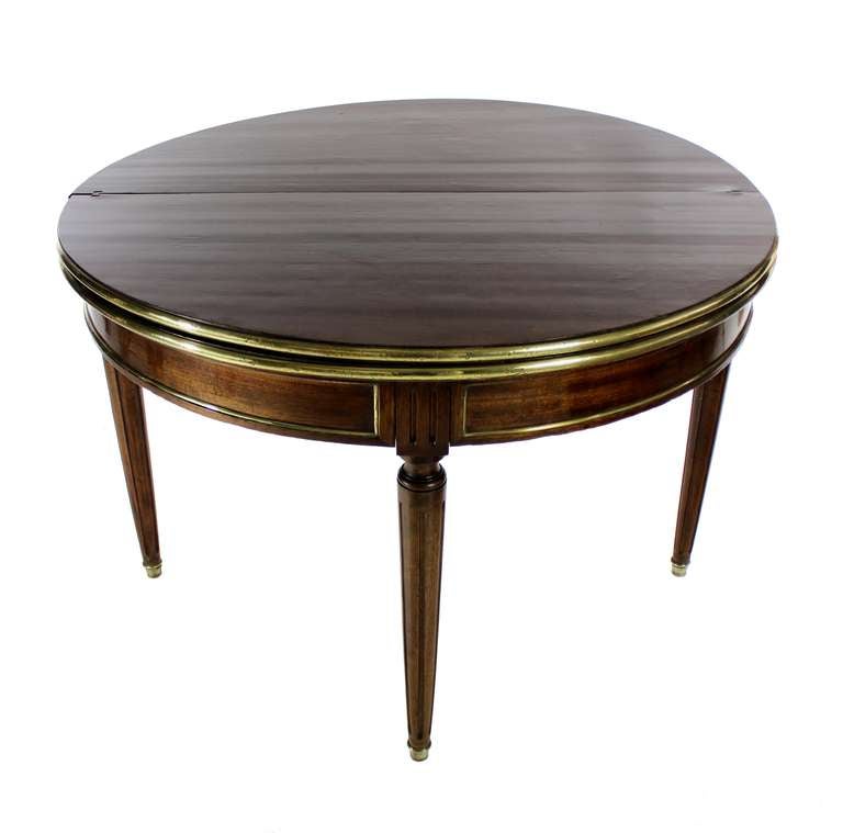 A Fine Louis XVI Mahogany Three Fold Games Table
