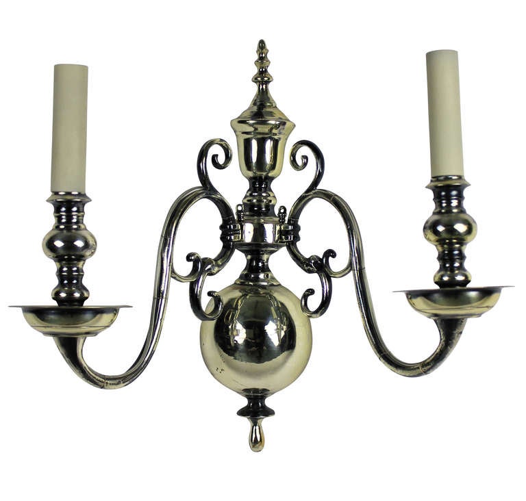A pair of fine English twin branch silver plated wall lights.