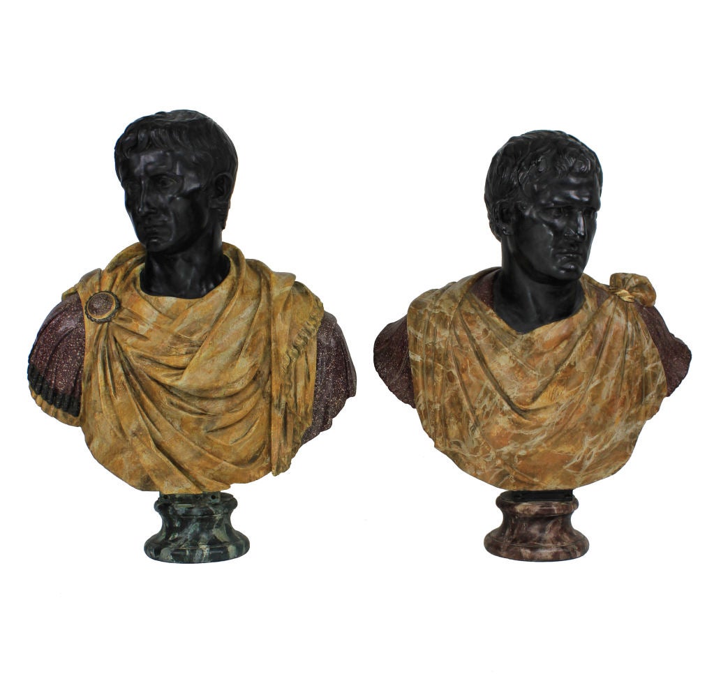 A pair of large and impressive late 19th Century Roman Emperor busts in faux marbled plaster. The scale being larger than life size, they are painted to resemble basalt, porphyry, Sienna marble and antico verdi. Fully restored.