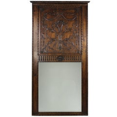 A Large French Finely Carved Walnut Trumeau Mirror