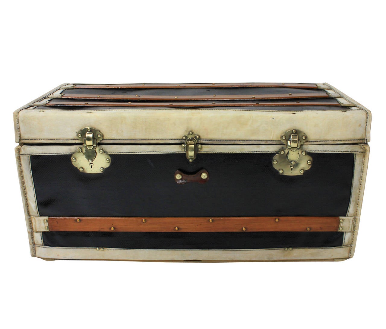 A large decorative English cabin trunk, with wooden struts, a wicker interior and covered in painted canvas throughout. With beautiful brass ornate latches and retaining some original labels.