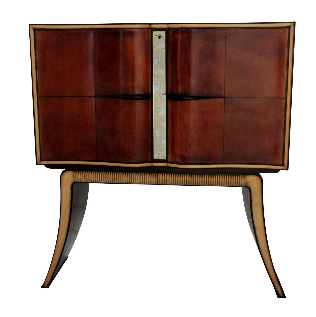 A stylish bar cabinet attributed to Borsani, on a splayed base with pale wood trim detail, two drawers, a distressed mirror detail to the door and sculptural handles. The bar interior has the original etched inner door panels, tiled mirror detailing