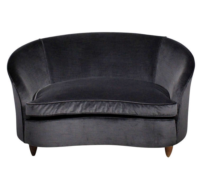 An Italian curvaceous love seat attr to Ico Parisi, perfect for a bedroom. Newly upholstered in blue / grey ribbed velvet.