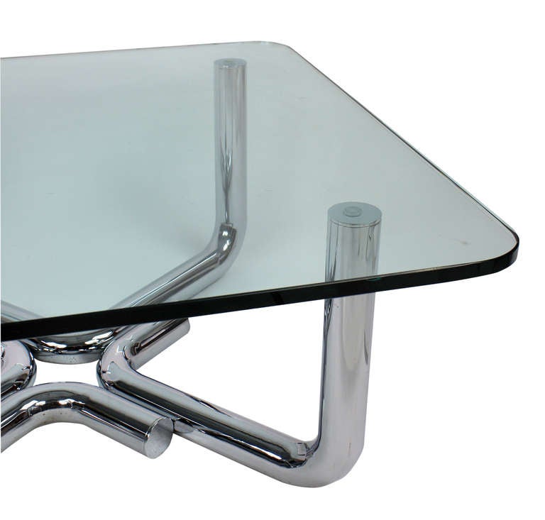 A large Italian tubular chrome occasional table with a plate glass top. Of good heavy construction.