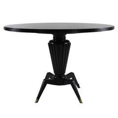 An Unusual 50
s Italian Dining Table In Ebonized Mahogany