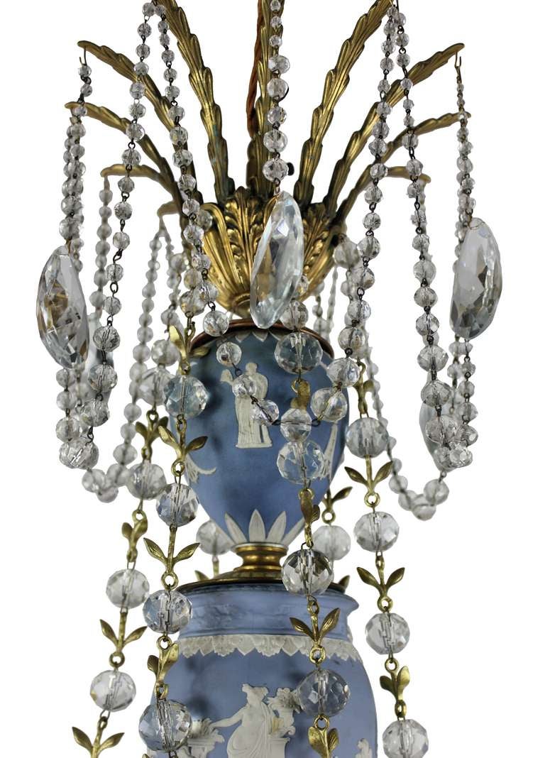 An English chandelier by Wedgwood with blue jasperware, ormolu and cut glass throughout.