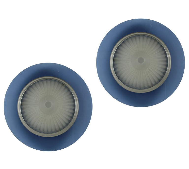 A pair of Italian wall or ceiling lights by Artluce. In opaque blue glass with a ribbed conical centre.
