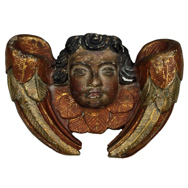 A Pair Of Spanish Carved Polychrome Cherubs