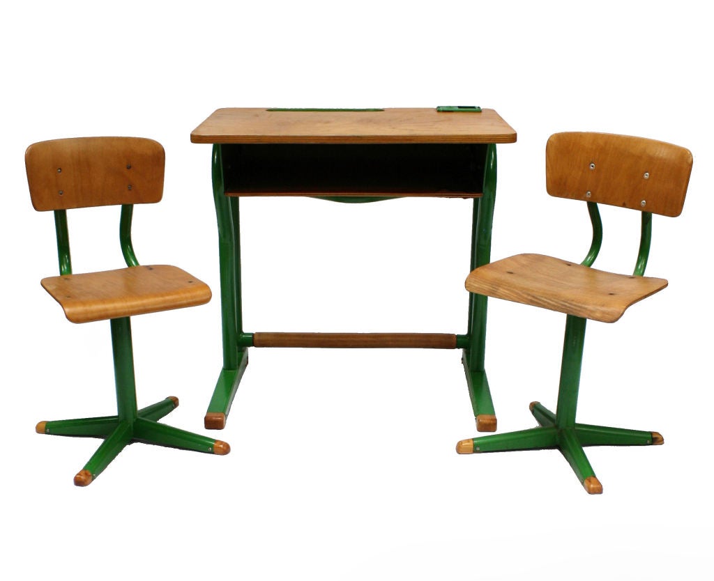 A French child's desk with two matching chairs. The desk has an inkwell and shelf beneath. Re-painted in the original colour.
