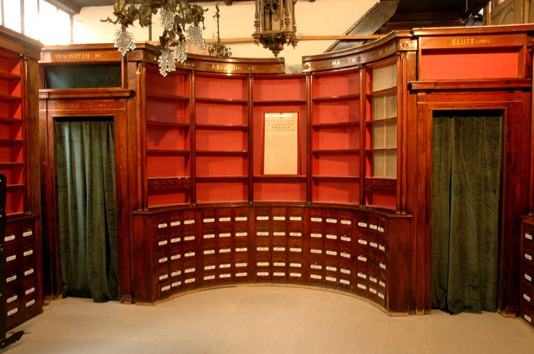 This exceptional and rare paneled room comes from an herbalist's shop in Colmar, North-East of France. It was realized circa 1825. The structure is made of oak with Brazilian rosewood veneer and satinwood molding. 
The paneled room is composed with