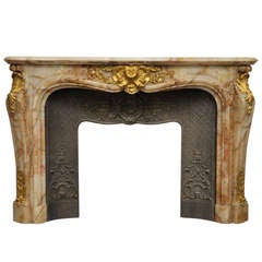 Exceptional Antique Louis XV Style Fireplace in Onyx Marble and Bronze Ornaments