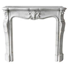 Antique Louis XV style fireplace in white Carrara marble, Period 19th c.