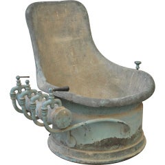 Antique brass bathroom seat.