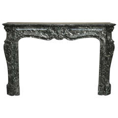 Large antique Louis XV style fireplace made out of Sea Green Marble, 19th century period.