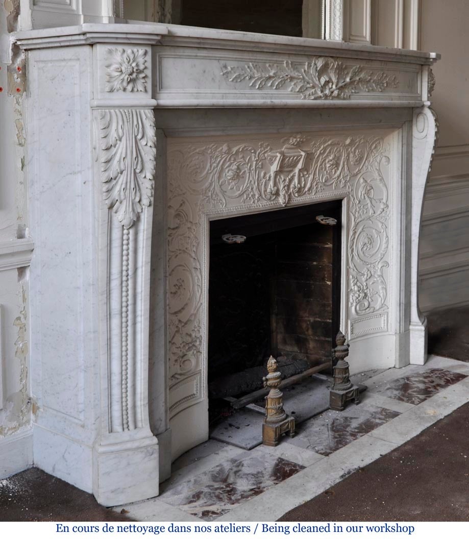French Antique Louis XVI Style Fireplace with Cured Frieze, 19th Century
