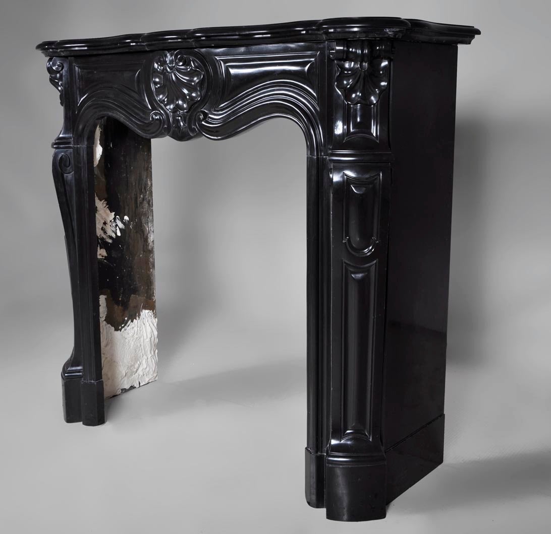 19th Century Small Antique Louis XV Style Fireplace Sculpted in Black Belgian Marble