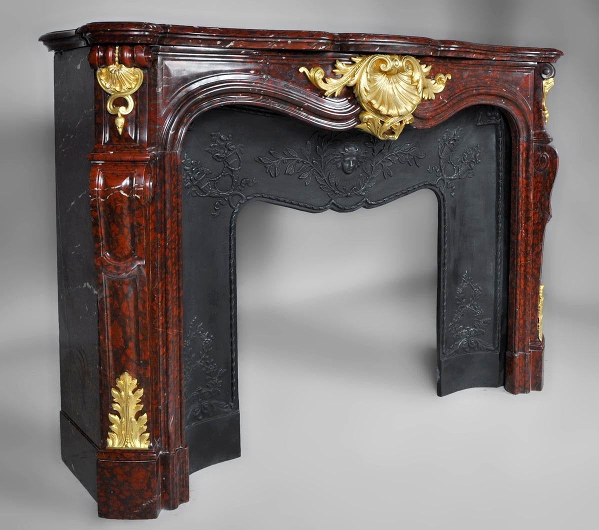 French Beautiful Louis XV Style Fireplace of Red Griotte Marble with Bronze Ornaments